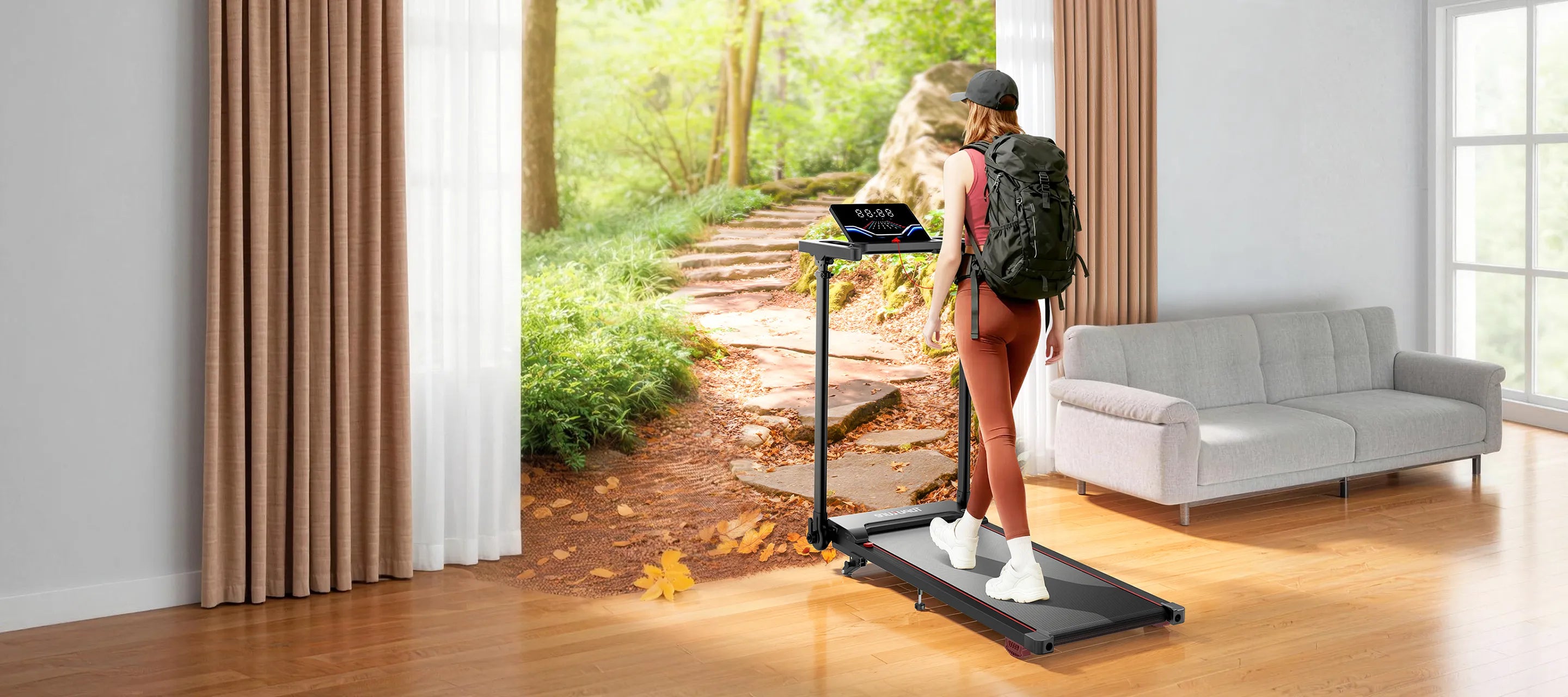 Person using a treadmill with a scenic view in a living room.
