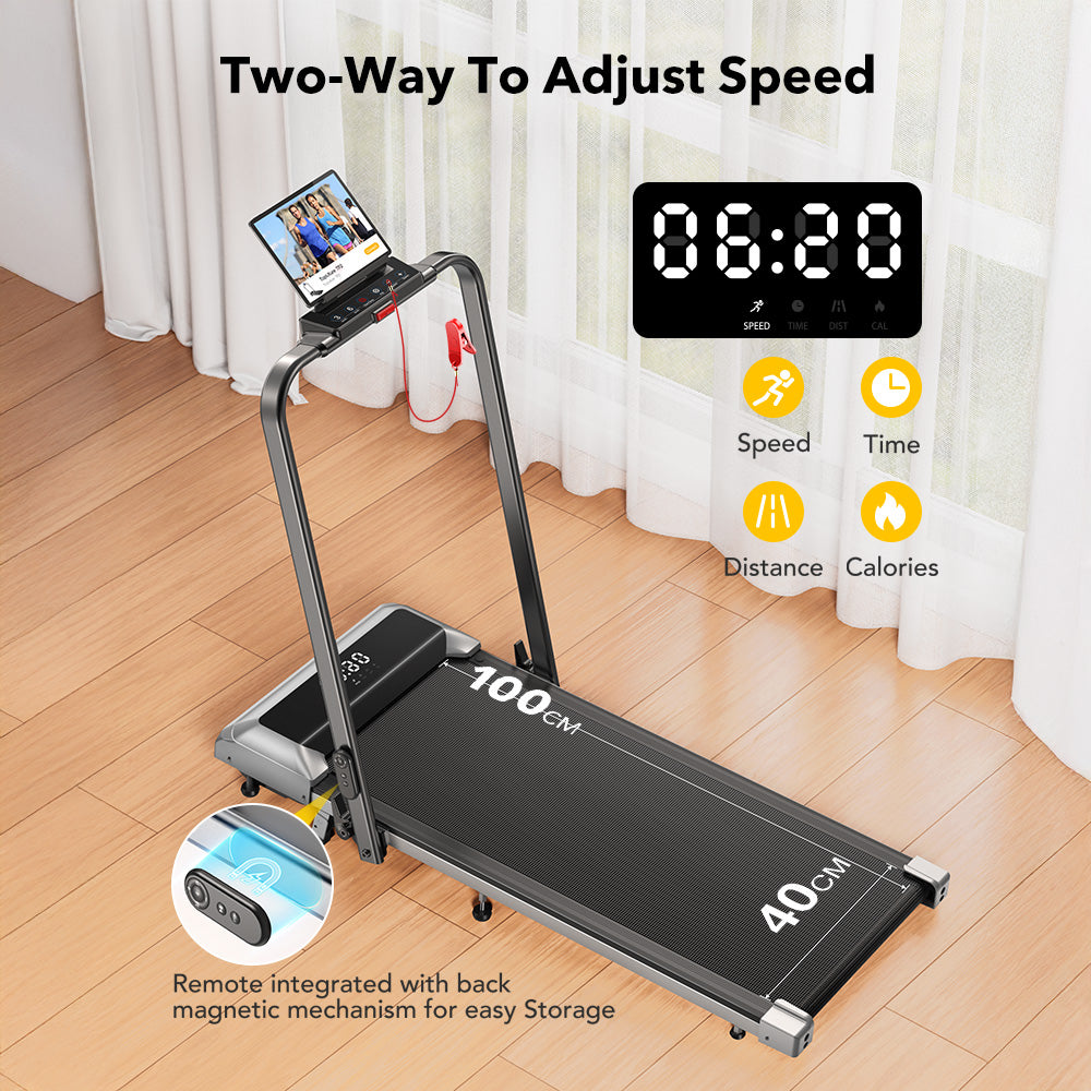 Portable treadmill with digital display and remote control on a wooden floor.