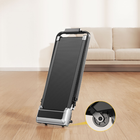 
A Toputure walking pad with built-in transport wheels glides smoothly across the floor for easy repositioning and storage