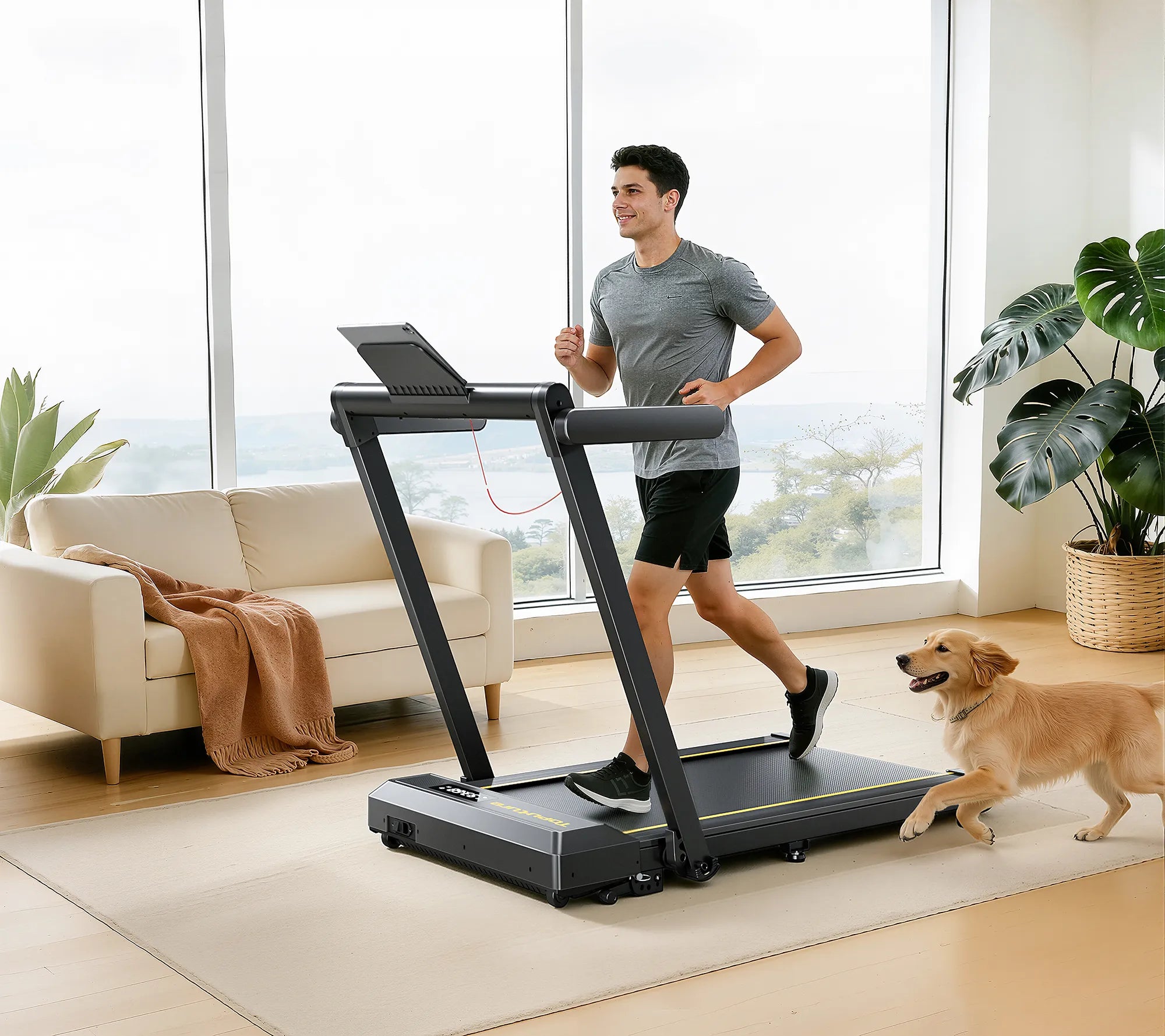 A man running on a treadmill at home, with his dog running energetically beside him, sharing an active lifestyle.
