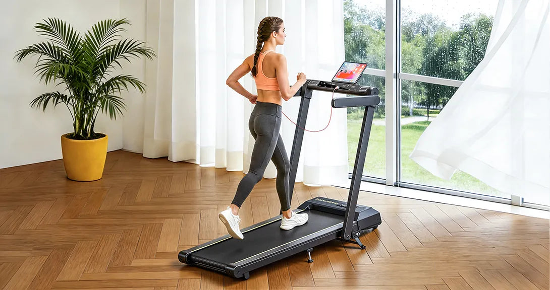 A woman running on a treadmill in her living room, enjoying a convenient and effective workout at home.