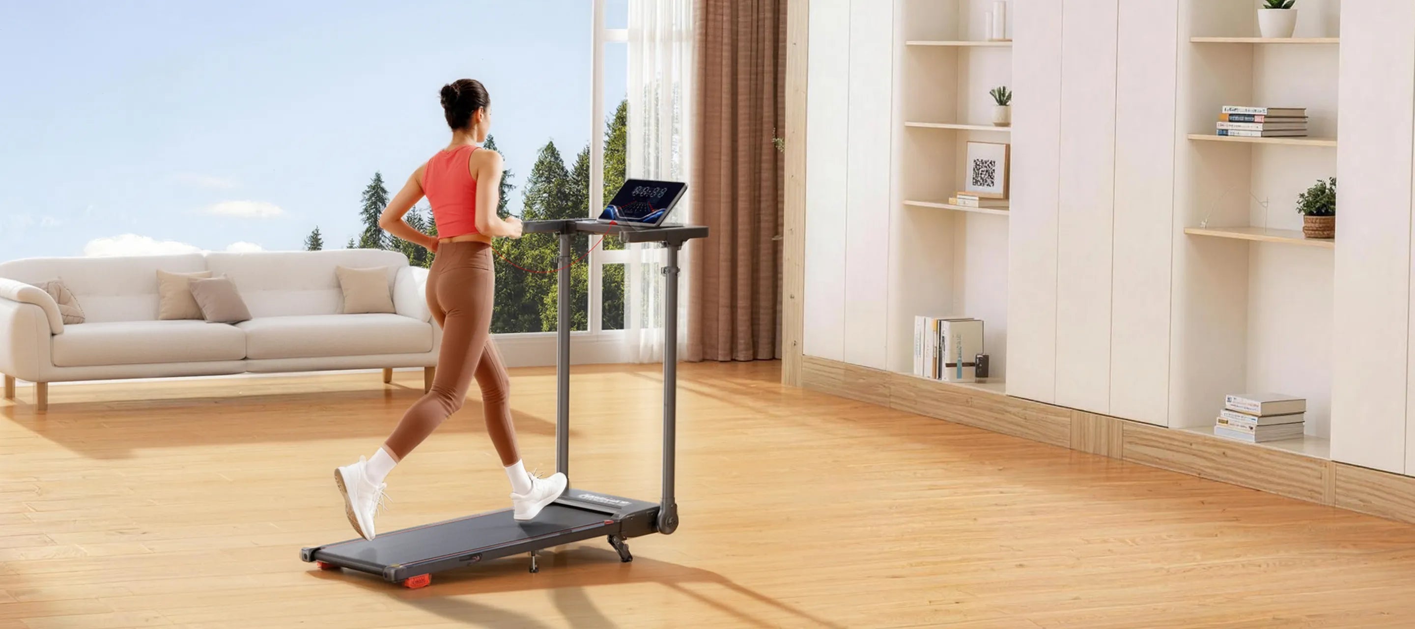 Woman using a treadmill in a modern living room.
