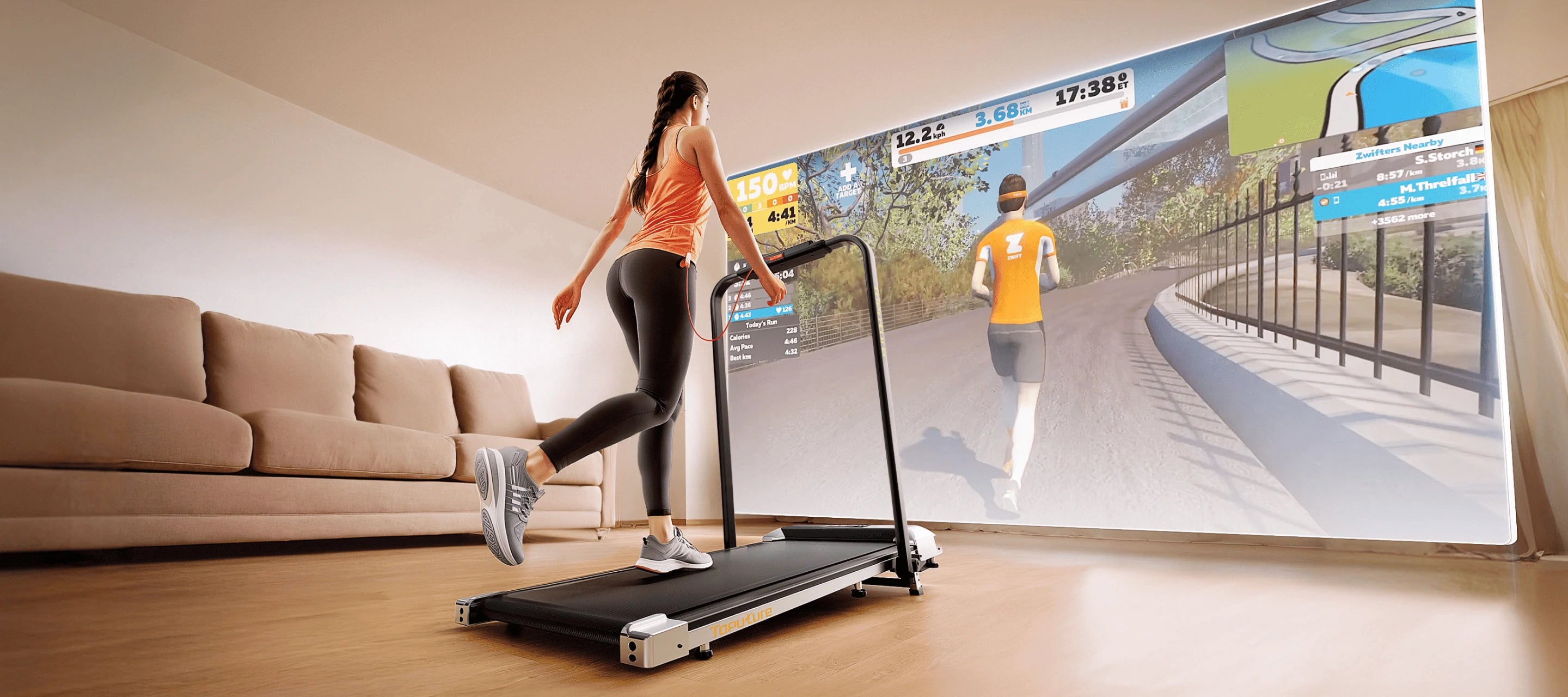 A woman runs on a treadmill at home, fully engaged with the immersive large screen displaying a scenic virtual running path.