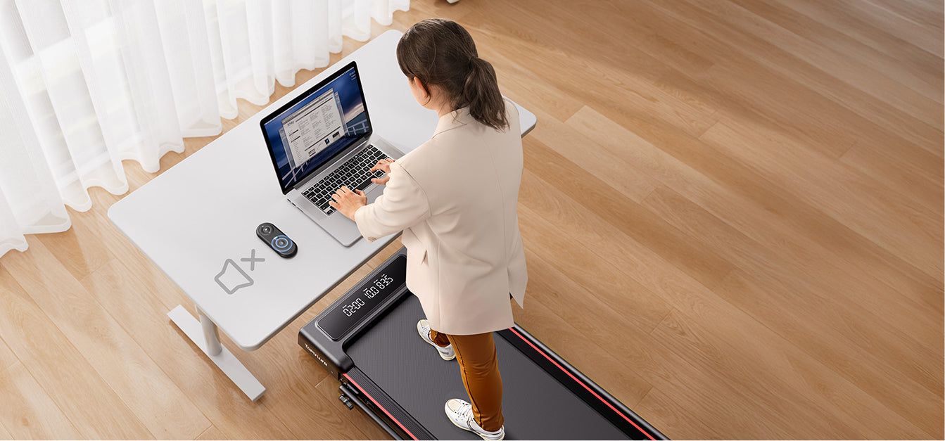 A woman incorporates movement into her daily routine by walking on TP4, making fitness a natural part of her lifestyle.
