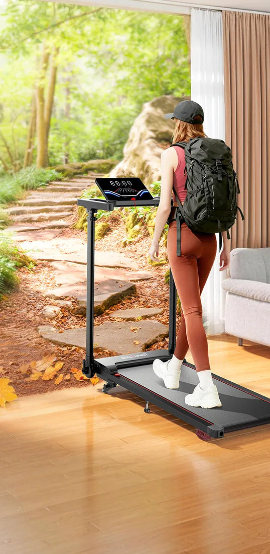 Person using a TP7 treadmill in a home setting with a scenic view outside
